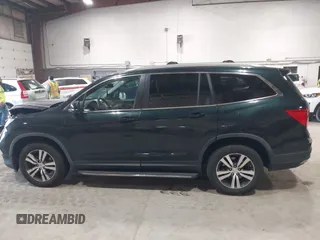 2016 Honda Pilot EX-L with VIN 5FNYF6H58GB045476, listed as a IAAI auction lot 42062966 with 102,290 mi miles. Bid and sale history available at carsss.com. Image 14.