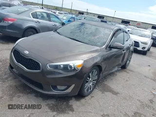2014 Kia Cadenza Premium z VIN KNALN4D74E5144896, wystawiony jako IAAI lot #42466220 z przebiegiem 157 654 mil mil oraz . Historia ofert i sprzedaży dostępna na DreamBid. Obrazek 2.