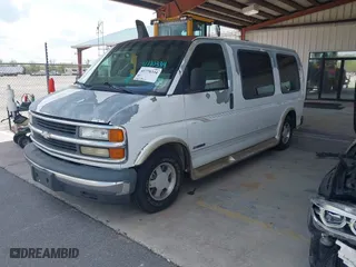 2002 Chevrolet Express Van with VIN 1GBFG15R021225474, listed as a IAAI auction lot 41770334 with 190,059 mi miles. Bid and sale history available at carsss.com. Image 2.