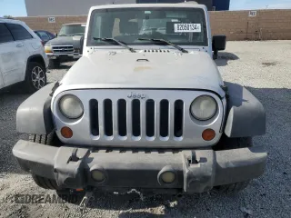 2007 Jeep Wrangler Unlimited X with VIN 1J8GB39157L142982, listed as a Copart auction lot 82050134 with 72,666 mi miles and Salvage Title. Bid and sale history available at DreamBid. Image 5.