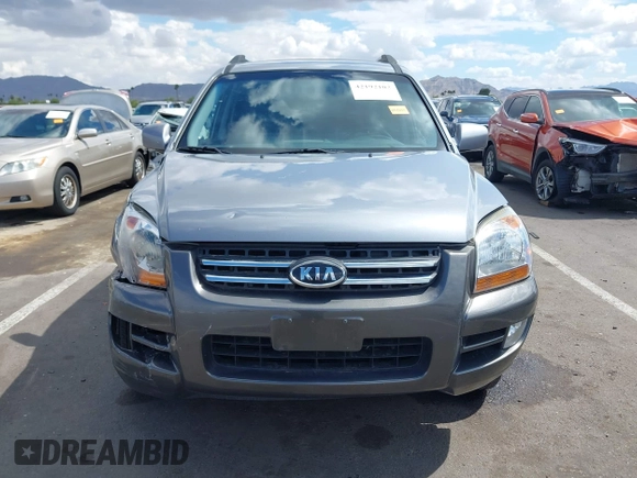 2005 Kia Sportage LX with VIN KNDJE723257122055, listed as a IAAI auction lot 42192102 with 167,726 mi miles and . Bid and sale history available at carsss.com. Image 12.