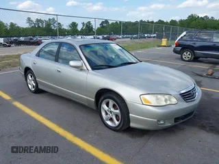 2002 Mazda Millenia with VIN JM1TA221721722364, listed as a IAAI auction lot 42160683 with 166,778 mi miles and . Bid and sale history available at DreamBid. Image 1.