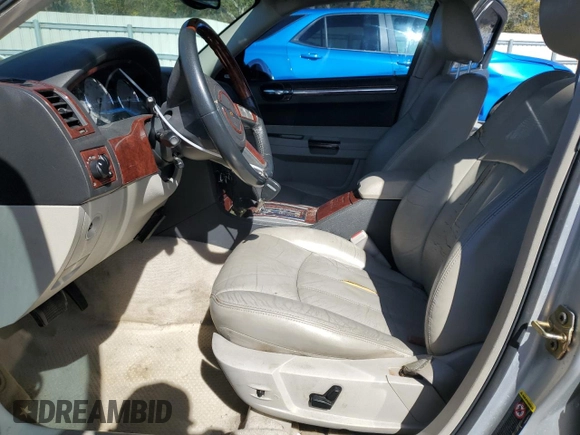 2005 Chrysler 300 with VIN 2C3AA63H95H657666, listed as a Copart auction lot 47989065 with 195,184 mi miles and Salvage Title. Bid and sale history available at carsss.com. Image 7.