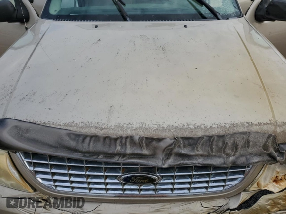 2004 Ford Explorer XLT z VIN 1FMZU73K44UB98061, wystawiony jako Copart lot #52914385 z przebiegiem Nie podano mil oraz Szkoda całkowita • Salvage title. Historia ofert i sprzedaży dostępna na DreamBid. Obrazek 12.