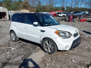 2012 Kia Soul + with VIN KNDJT2A64C7470988, listed as a IAAI auction lot 41082059 with 124,592 mi miles. Bid and sale history available at carsss.com. Image 1.