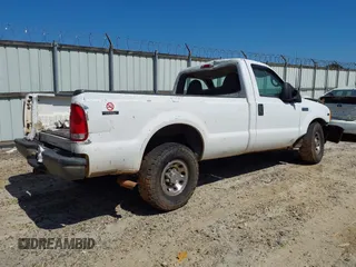 1999 Ford Super Duty F-250 XL with VIN 1FTNF20L3XEC76809, listed as a IAAI auction lot 40153294 with 457,050 mi miles. Bid and sale history available at carsss.com. Image 4.