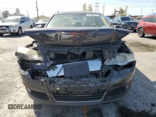 2010 Volkswagen Passat Komfort with VIN WVWJK7ANXAE129739, listed as a Copart auction lot 57798275 with 155,830 mi miles and Salvage title. Bid and sale history available at DreamBid. Image 5.
