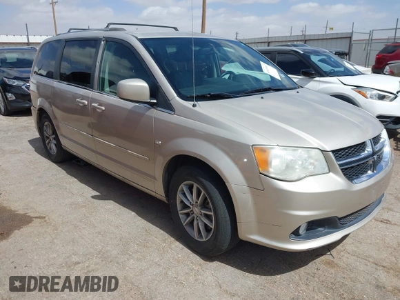 2014 Dodge Grand Caravan SXT with VIN 2C4RDGCG6ER466459, listed as a IAAI auction lot 41820907 with 105,404 mi miles and . Bid and sale history available at DreamBid. Image 1.