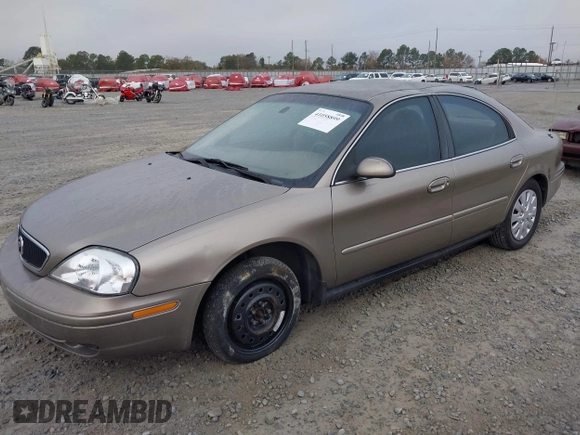2003 Mercury Sable GS z VIN 1MEFM50U33A606937, wystawiony jako IAAI lot #41058899 z przebiegiem 138 479 mil mil oraz . Historia ofert i sprzedaży dostępna na DreamBid. Obrazek 2.