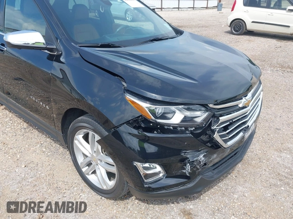 2021 Chevrolet Equinox Premier with VIN 2GNAXNEV5M6151910, listed as a IAAI auction lot 42110010 with 45,911 mi miles and . Bid and sale history available at DreamBid. Image 12.
