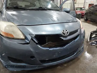 2007 Toyota Yaris with VIN JTDBT903371175510, listed as a IAAI auction lot 41573587 with 218,210 mi miles. Bid and sale history available at carsss.com. Image 6.