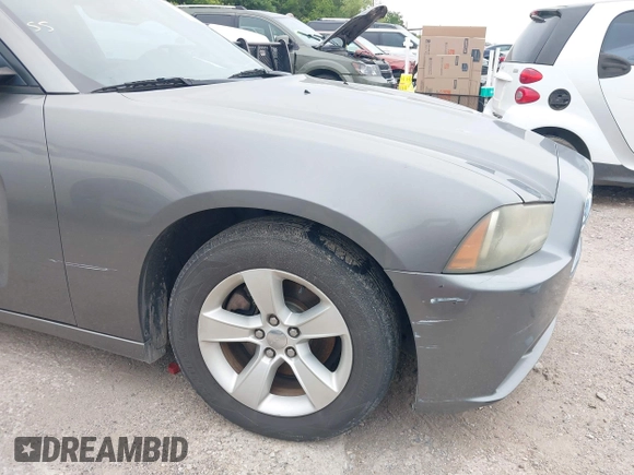 2012 Dodge Charger SE with VIN 2C3CDXBGXCH208914, listed as a IAAI auction lot 42195432 with 193,562 mi miles and . Bid and sale history available at DreamBid. Image 6.