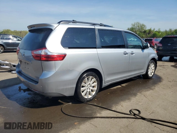 2015 Toyota Sienna Limited with VIN 5TDDK3DCXFS114708, listed as a Copart auction lot 55411465 with Not Provided miles and Salvage Title. Bid and sale history available at DreamBid. Image 3.