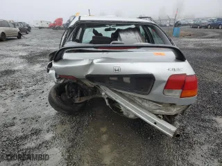 1996 Honda Civic LX "O" w/Air with VIN 1HGEJ6677TL017344, listed as a Copart auction lot 82582494 with 202,514 mi miles and Salvage Title. Bid and sale history available at carsss.com. Image 6.