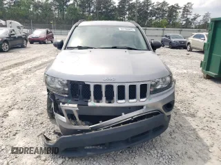 2017 Jeep Compass Sport z VIN 1C4NJCBB9HD117714, wystawiony jako Copart lot #52106065 z przebiegiem 169 246 mil mil oraz Szkoda całkowita • Salvage title. Historia ofert i sprzedaży dostępna na DreamBid. Obrazek 5.