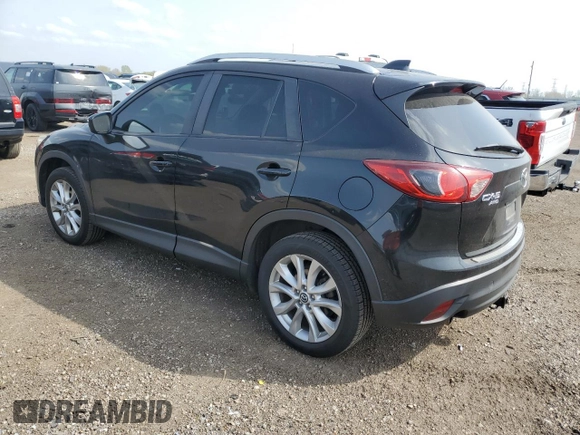 2015 Mazda CX-5 Grand Touring with VIN JM3KE4DY9F0516357, listed as a Copart auction lot 53156215 with 118,621 mi miles and Salvage Title. Bid and sale history available at DreamBid. Image 2.