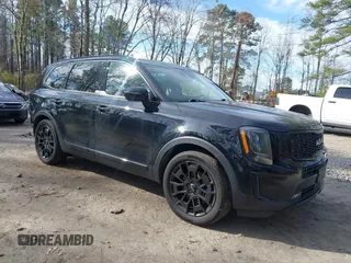 2022 Kia Telluride SX z VIN 5XYP5DHC7NG296481, wystawiony jako IAAI lot #41759359 z przebiegiem 46 857 mil mil oraz . Historia ofert i sprzedaży dostępna na DreamBid. Obrazek 1.