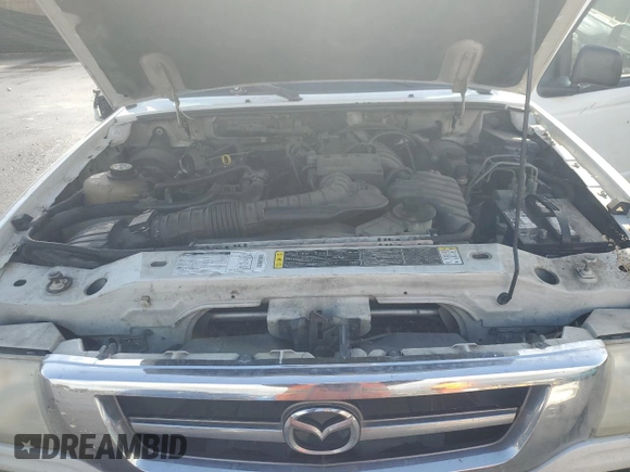 2002 Mazda B-Series Truck SX with VIN 4F4YR12D82TM01061, listed as a Copart auction lot 49449545 with Not Provided miles and Non Repairable. Bid and sale history available at DreamBid. Image 11.