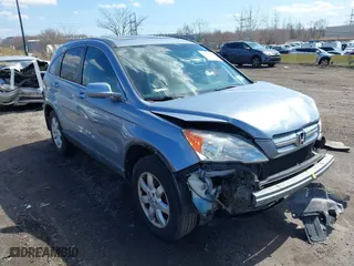 2009 Honda CR-V EX-L with VIN 5J6RE48799L065209, listed as a IAAI auction lot 41868398 with 111,385 mi miles. Bid and sale history available at carsss.com. Image 1.