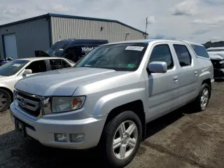 2009 Honda Ridgeline RTL with VIN 5FPYK16509B101275, listed as a Copart auction lot 63528145 with 100,580 mi miles and Salvage title. Bid and sale history available at DreamBid. Image 1.