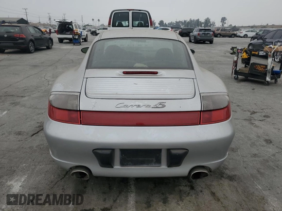 2004 Porsche 911 Carrera z VIN WP0AA29904S623031, wystawiony jako Copart lot #76551074 z przebiegiem 145 478 mil mil oraz Szkoda całkowita • Salvage title. Historia ofert i sprzedaży dostępna na DreamBid. Obrazek 6.