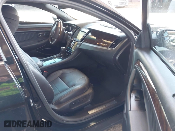 2015 Ford Taurus Limited with VIN 1FAHP2F8XFG135452, listed as a IAAI auction lot 42003510 with 71,476 mi miles. Bid and sale history available at carsss.com. Image 5.