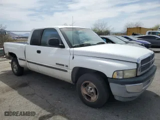 1999 Dodge Ram 1500 with VIN 3B7HC13Z4XG127818, listed as a Copart auction lot 52090945 with 245,977 mi miles and Clean Title. Bid and sale history available at carsss.com. Image 4.
