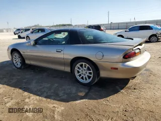 2001 Chevrolet Camaro Z28 z VIN 2G1FP22G712124948, wystawiony jako Copart lot #76083164 z przebiegiem 21 108 mil mil oraz Szkoda całkowita • Salvage title. Historia ofert i sprzedaży dostępna na DreamBid. Obrazek 2.