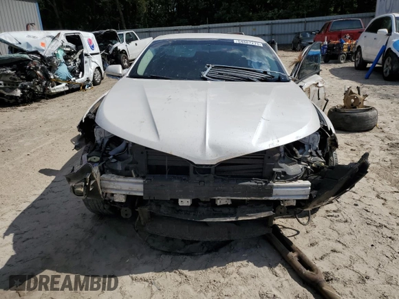 2013 Lincoln MKZ z VIN 3LN6L2GK2DR823745, wystawiony jako Copart lot #54887275 z przebiegiem 163 267 mil mil oraz Szkoda całkowita • Salvage title. Historia ofert i sprzedaży dostępna na DreamBid. Obrazek 5.