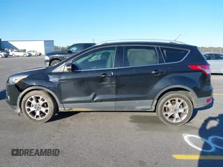 2016 Ford Escape Titanium with VIN 1FMCU0JX3GUA90420, listed as a IAAI auction lot 41850537 with 115,770 mi miles. Bid and sale history available at carsss.com. Image 14.