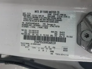 2017 Ford Fusion Titanium z VIN 3FA6P0SUXHR268559, wystawiony jako Copart lot #57456085 z przebiegiem 124 072 mil mil oraz Szkoda całkowita • Salvage title. Historia ofert i sprzedaży dostępna na DreamBid. Obrazek 12.