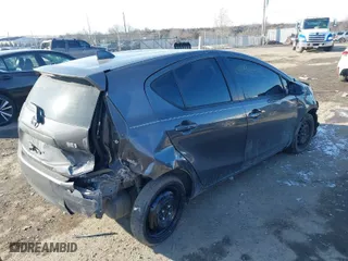2015 Toyota Prius c One with VIN JTDKDTB36F1113749, listed as a IAAI auction lot 41366238 with 121,610 mi miles. Bid and sale history available at carsss.com. Image 4.