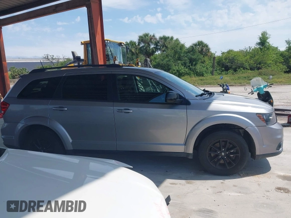 2019 Dodge Journey SE with VIN 3C4PDCBB0KT848601, listed as a IAAI auction lot 41991558 with 76,272 mi miles and . Bid and sale history available at DreamBid. Image 14.