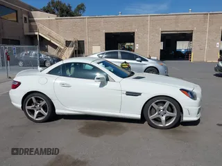 2013 Mercedes-Benz SLK-Class SLK 250 with VIN WDDPK4HA9DF057092, listed as a IAAI auction lot 42032120 with 142,991 mi miles. Bid and sale history available at carsss.com. Image 13.