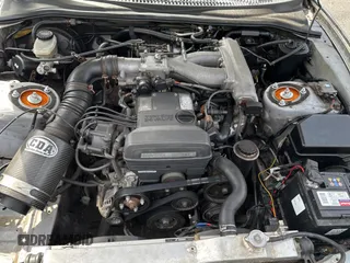 1993 Toyota Supra с VIN JZA800010229, выставлен на аукционе Copart как лот 50000065 с пробегом 130 612 миль миль и Чистый • Clean title. История ставок и продаж доступна на DreamBid. Изображение 7.