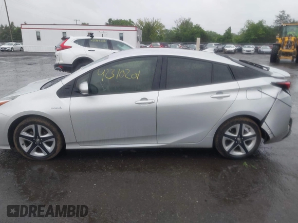 2017 Toyota Prius Two with VIN JTDKARFU4H3043433, listed as a IAAI auction lot 42310201 with 50,715 mi miles and . Bid and sale history available at DreamBid. Image 14.