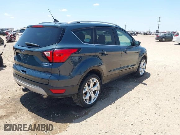 2019 Ford Escape Titanium с VIN 1FMCU9J92KUB56244, выставлен на аукционе IAAI как лот 42553011 с пробегом 37 201 миль миль и . История ставок и продаж доступна на DreamBid. Изображение 4.