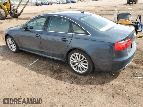 2014 Audi A6 Prestige with VIN WAUHMAFC1EN063193, listed as a Copart auction lot 51286155 with 121,015 mi miles and Salvage title. Bid and sale history available at DreamBid. Image 2.