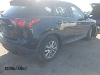 2016 Mazda CX-5 Touring with VIN JM3KE2CY6G0808992, listed as a IAAI auction lot 40969655 with 132,513 mi miles. Bid and sale history available at carsss.com. Image 4.