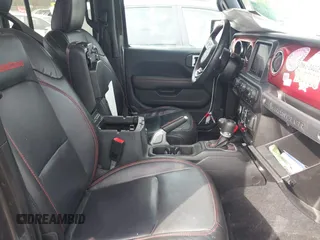 2020 Jeep Wrangler Unlimited Rubicon z VIN 1C4HJXFN8LW176002, wystawiony jako IAAI lot #41662158 z przebiegiem 55 924 mil mil oraz . Historia ofert i sprzedaży dostępna na DreamBid. Obrazek 5.