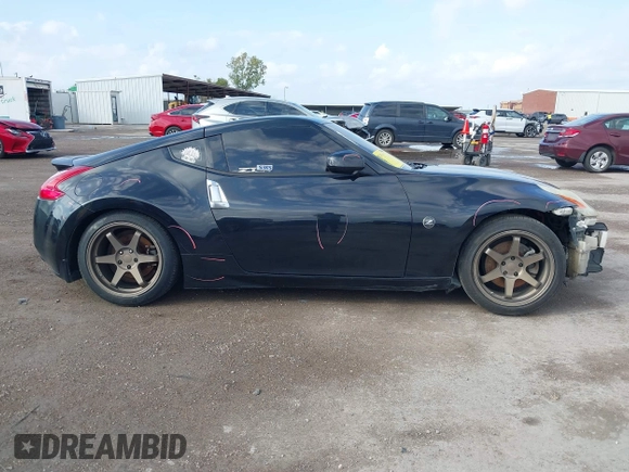 2015 Nissan 370Z Sport with VIN JN1AZ4EH8FM443095, listed as a IAAI auction lot 41105775 with 135,354 mi miles. Bid and sale history available at carsss.com. Image 13.