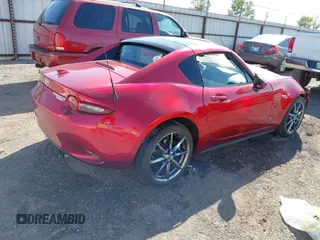 2020 Mazda MX-5 Miata Grand Touring z VIN JM1NDAM77L0418499, wystawiony jako IAAI lot #42010802 z przebiegiem 19 588 mil mil oraz . Historia ofert i sprzedaży dostępna na DreamBid. Obrazek 4.