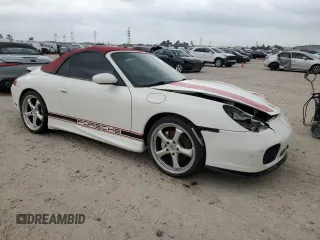 2000 Porsche 911 with VIN WP0CA2993YS650075, listed as a Copart auction lot 51613275 with 87,895 mi miles and Salvage Title. Bid and sale history available at DreamBid. Image 4.