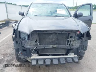 2017 Toyota Tacoma SR with VIN 5TFSX5EN9HX052395, listed as a IAAI auction lot 42290149 with 140,655 mi miles and . Bid and sale history available at DreamBid. Image 6.