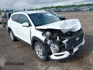 2019 Hyundai Tucson Value z VIN KM8J33A41KU013023, wystawiony jako IAAI lot #42302643 z przebiegiem 41 231 mil mil oraz . Historia ofert i sprzedaży dostępna na DreamBid. Obrazek 1.