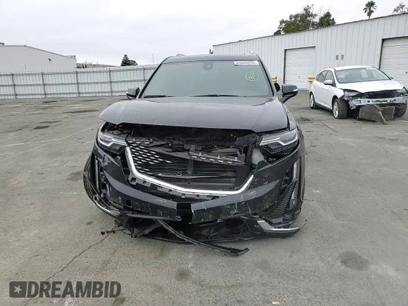 2022 Cadillac XT6 Premium Luxury with VIN 1GYKPDRS5NZ110989, listed as a Copart auction lot 69600894 with 56,148 mi miles and Salvage Title. Bid and sale history available at carsss.com. Image 11.