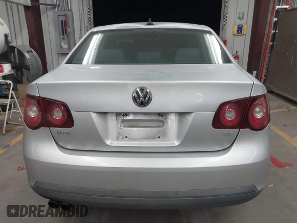 2009 Volkswagen Jetta Sedan SE with VIN 3VWRM71K09M033754, listed as a IAAI auction lot 41949678 with 198,344 mi miles. Bid and sale history available at carsss.com. Image 16.