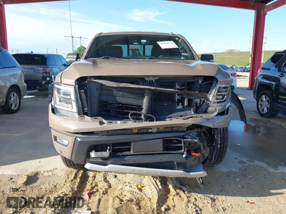 2021 Nissan Titan SV with VIN 1N6AA1ED1MN523973, listed as a IAAI auction lot 42406382 with 73,688 mi miles and . Bid and sale history available at DreamBid. Image 6.