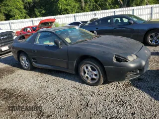 1999 Mitsubishi 3000GT z VIN JA3AM44HXXY002638, wystawiony jako Copart lot #67132454 z przebiegiem 181 684 mil mil oraz Tytuł czysty. Historia ofert i sprzedaży dostępna na DreamBid. Obrazek 4.