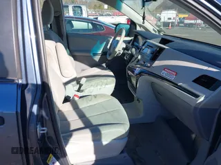 2014 Toyota Sienna L with VIN 5TDZK3DC0ES413970, listed as a IAAI auction lot 40870422 with 138,589 mi miles. Bid and sale history available at carsss.com. Image 5.